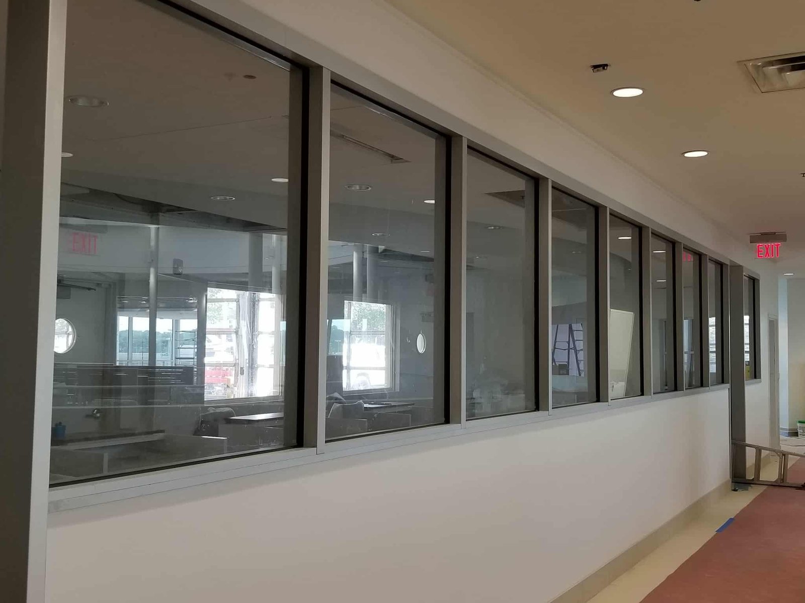 Wiping interior glass partitions after construction